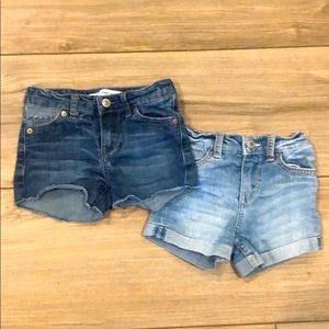 Two pairs of Levi’s shorty short denim shorts.